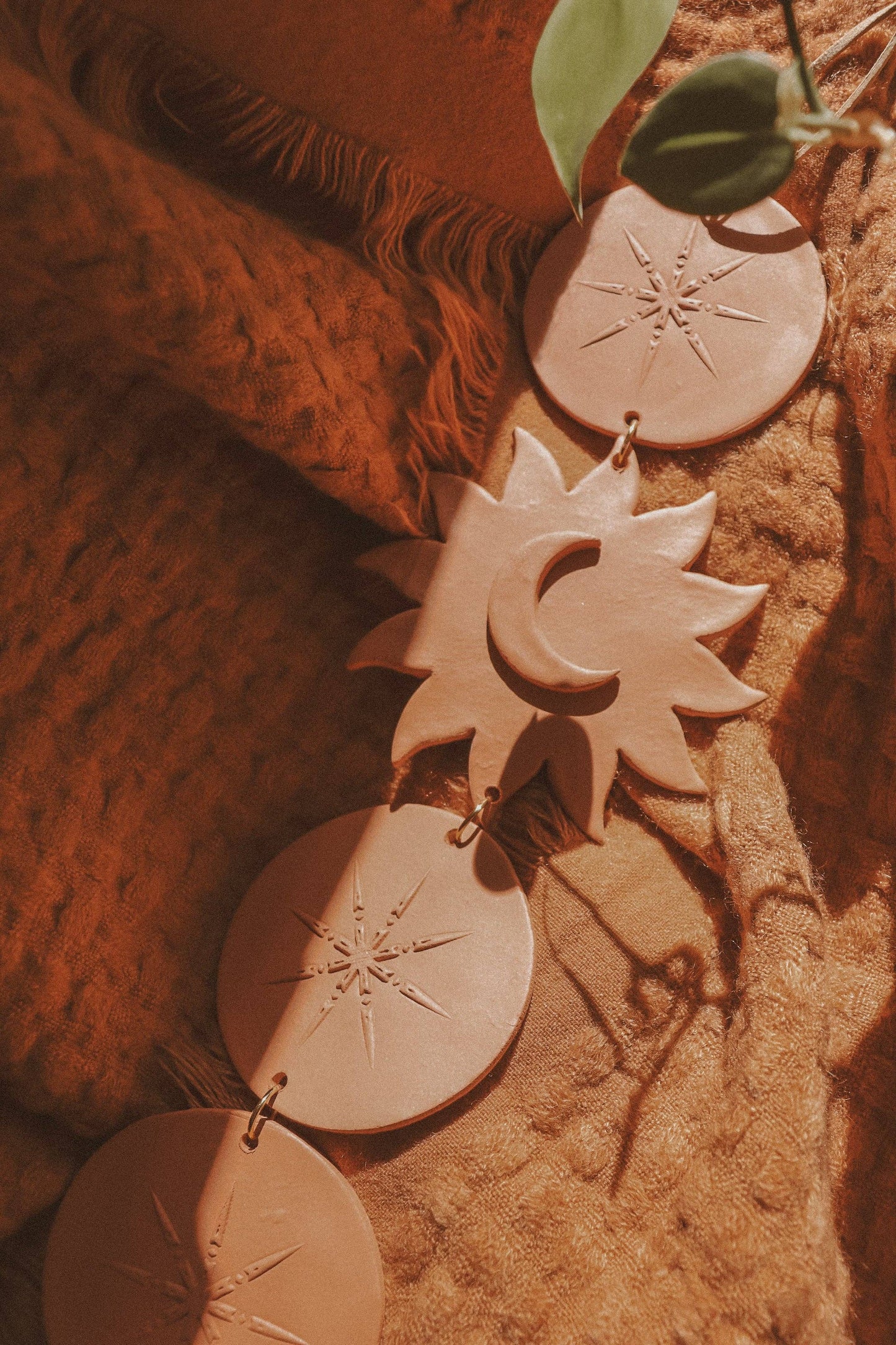 Celestial Sun and Moon Clay Wall Hanging: White Marble